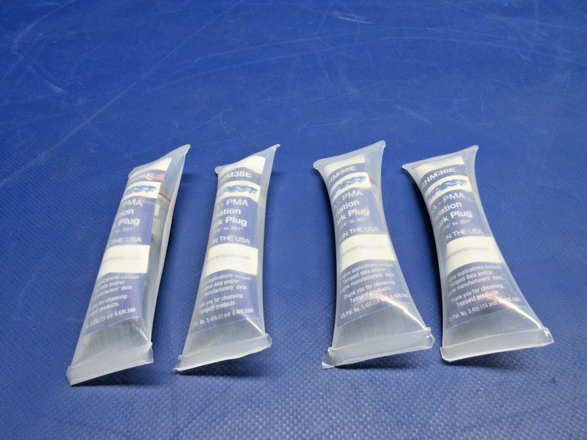 Tempest Spark Plug P/N URHM38E LOT OF 4 NOS (0826-854)1