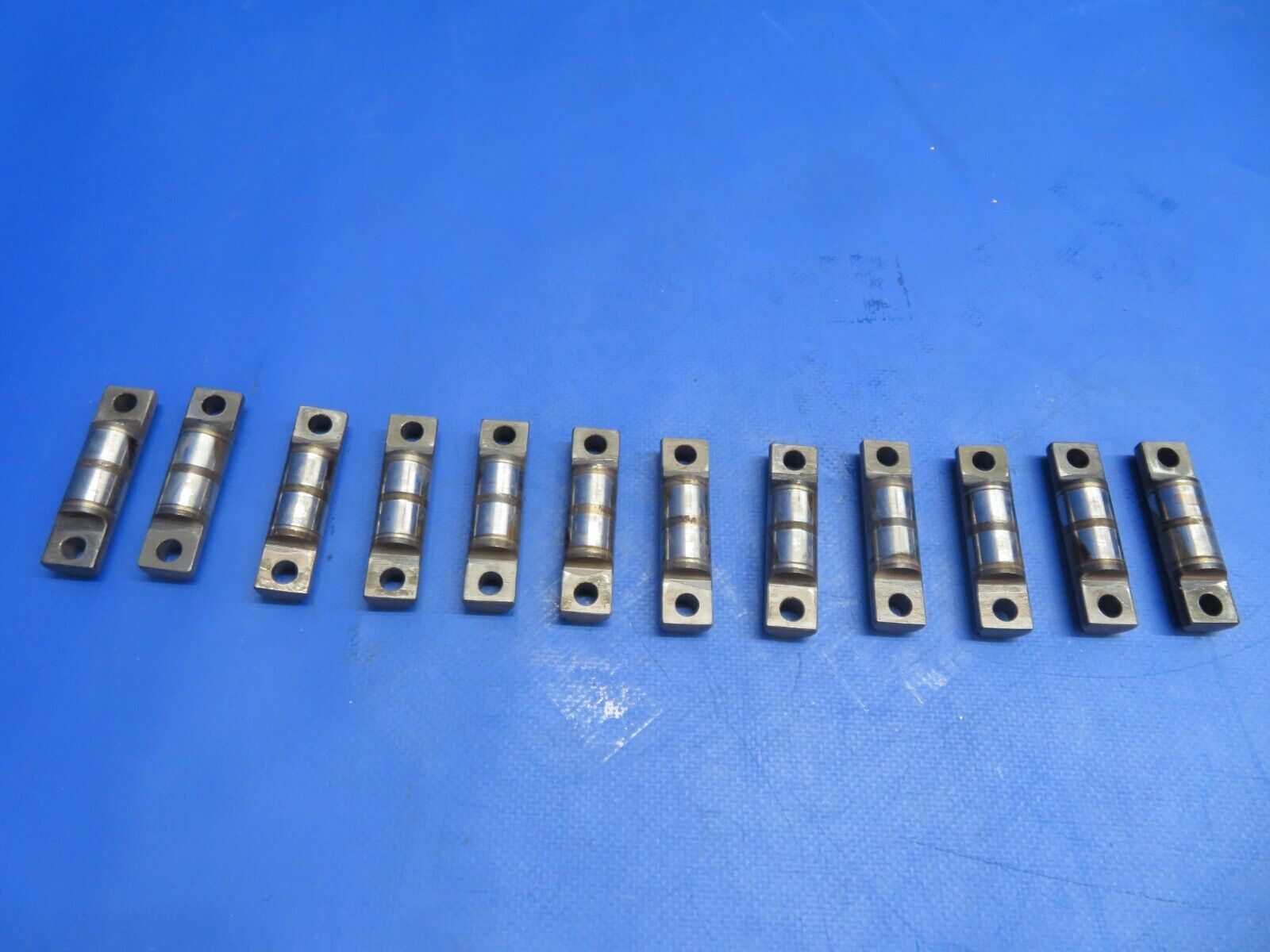 Continental TSIO-360 Shaft Rocker Valve P/N 656703 LOT OF 12 (0323-673)