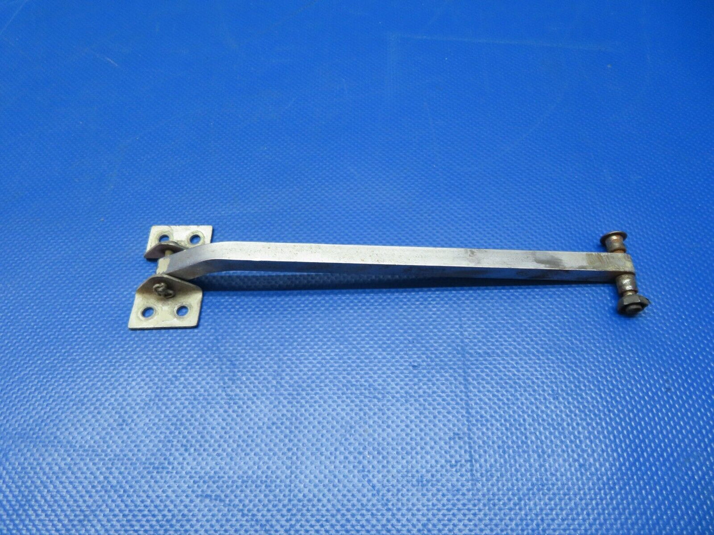 Cessna 337 / 337E Door Stop Arm Assy w/ Brackets P/N 1411206-2 (0124-249)