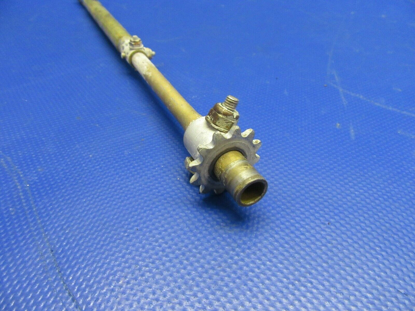 Beech 58 Baron Shaft & Sprocket Trim Tab P/N 95-524023-7 (0521-471)