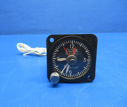 Borg Electric Clock P/N CA-7619, 58-380077-1 TESTED (0324-1734)