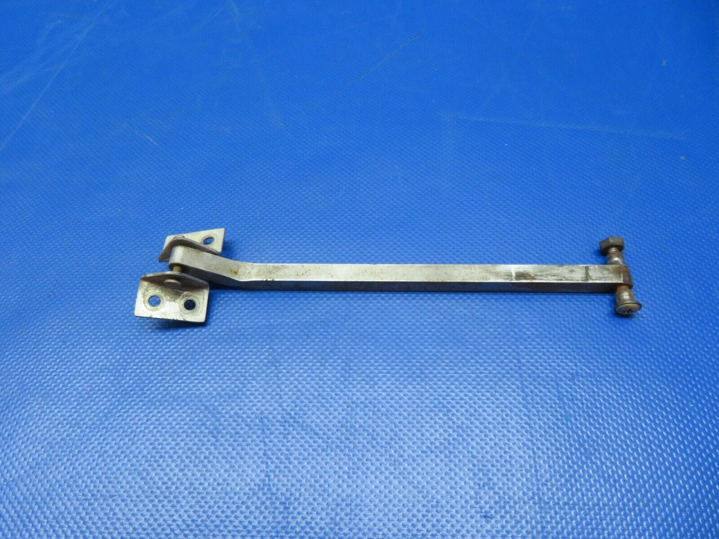 Cessna 337 / 337E Door Stop Arm Assy w/ Brackets P/N 1411206-2 (0124-249)